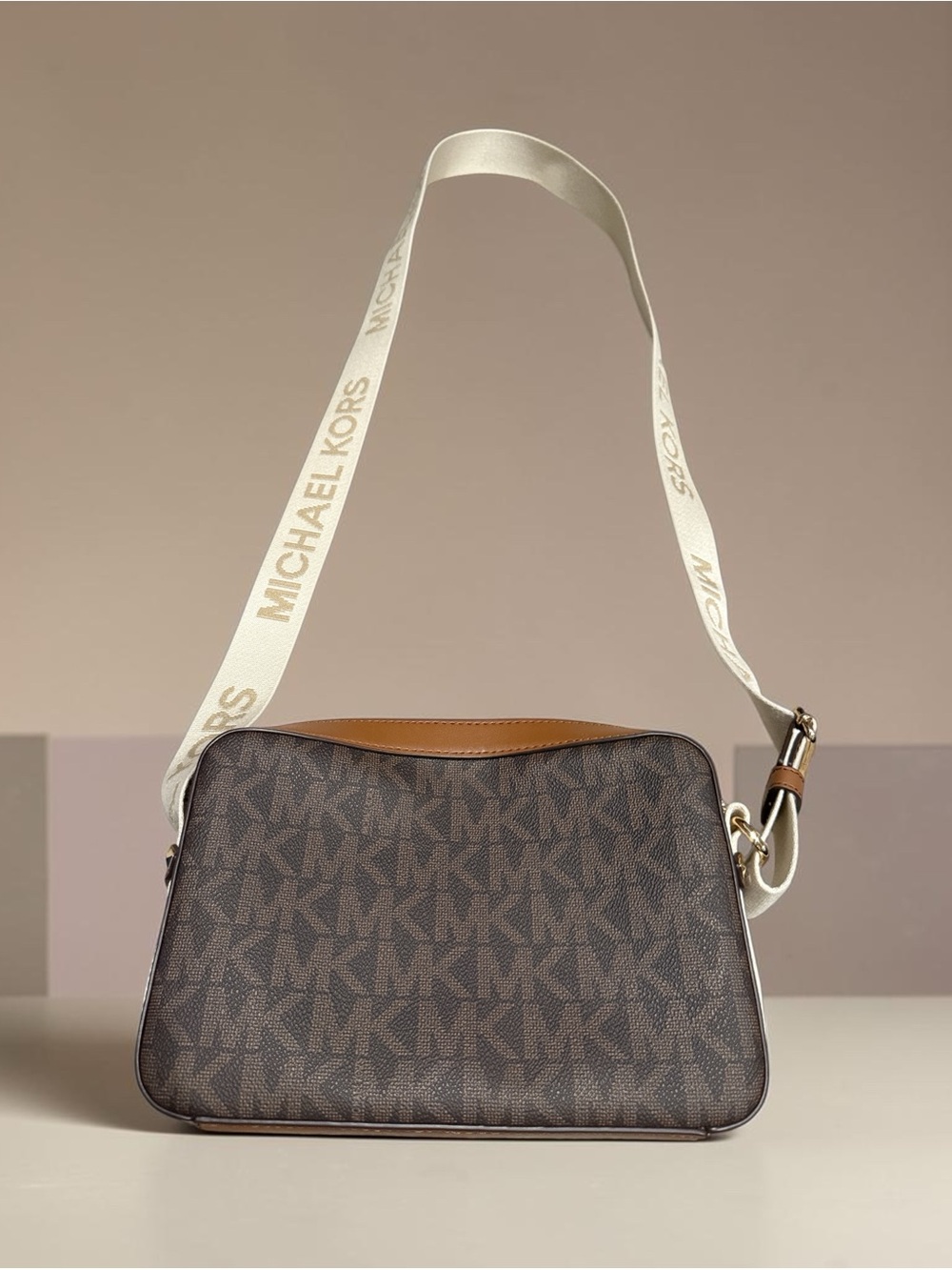 Michael Kors Brown Monogram Crossbody with Cream Logo Strap 7” X 9” bag
